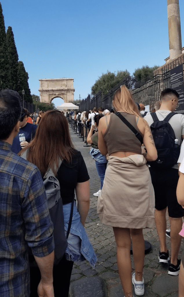 a group of people standing on a street