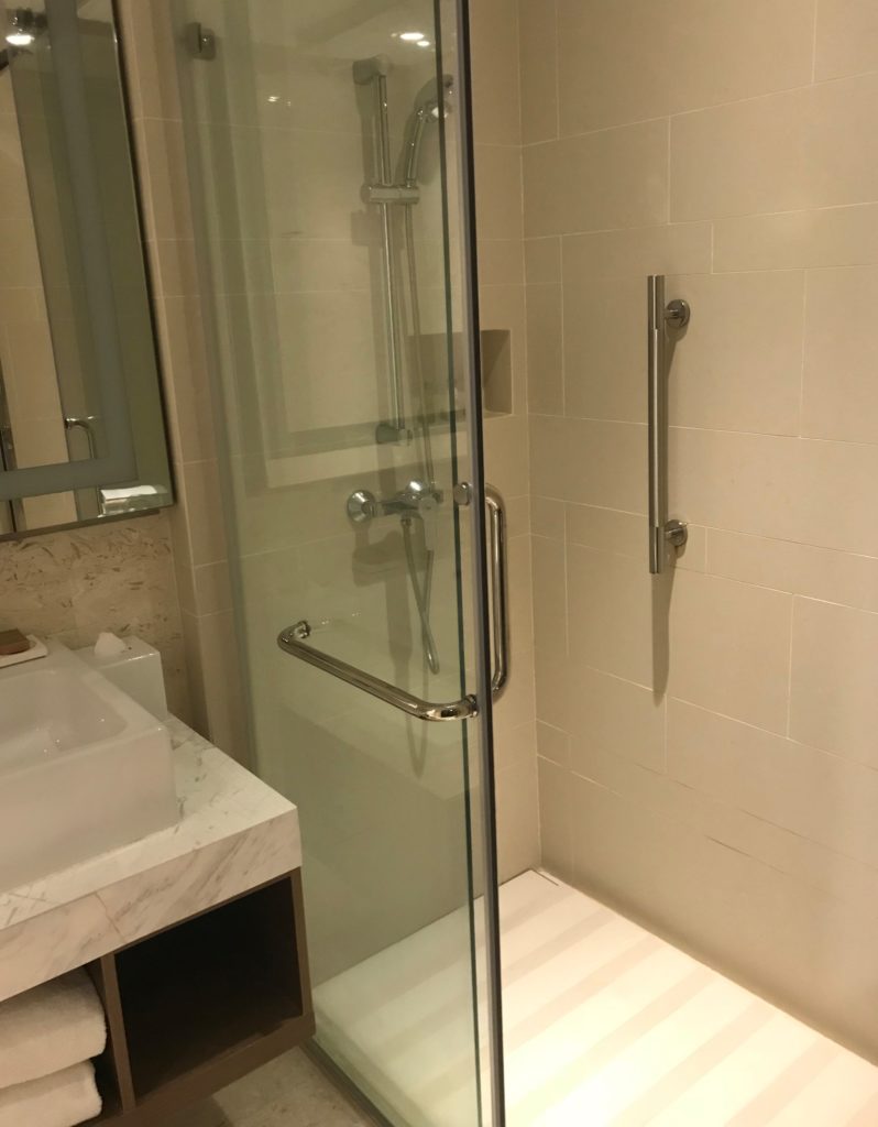 a shower with a glass door