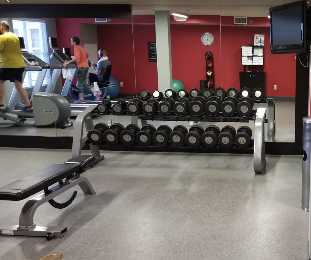 a gym with a group of people