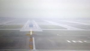 a runway with a plane on it