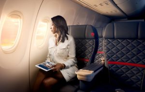 a woman sitting in an airplane