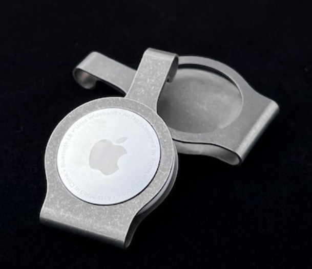 a silver metal object with a logo