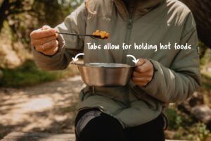 a person holding a bowl of food