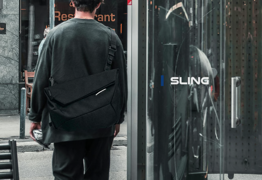 a man walking in front of a glass door