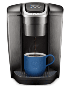 a coffee machine with a blue cup