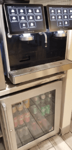 a machine with a drink dispenser