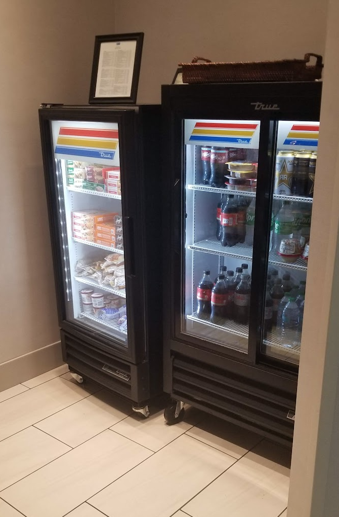 a refrigerators with drinks and beverages