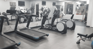 a room with treadmills and exercise machines