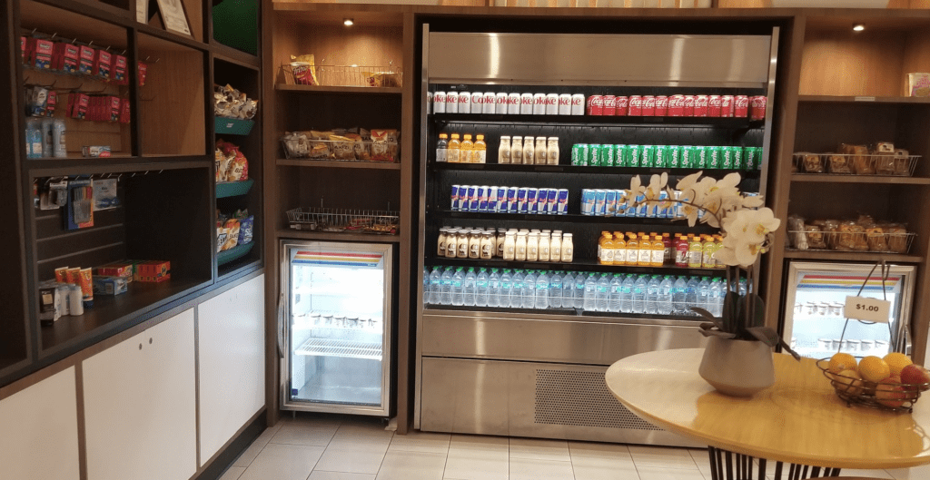 a refrigerator with drinks and beverages on shelves