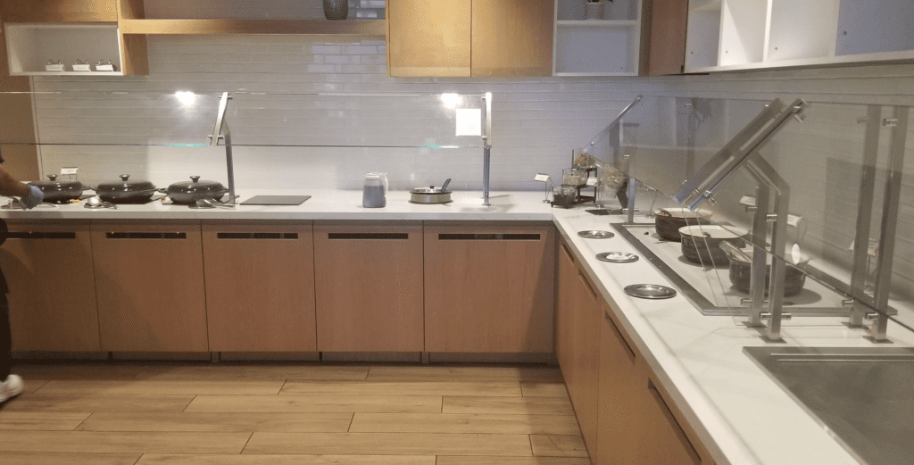 a kitchen with wood cabinets and a counter top