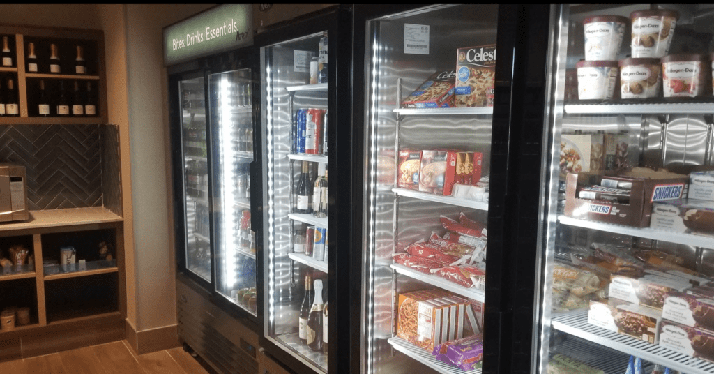 a refrigerator with drinks and snacks