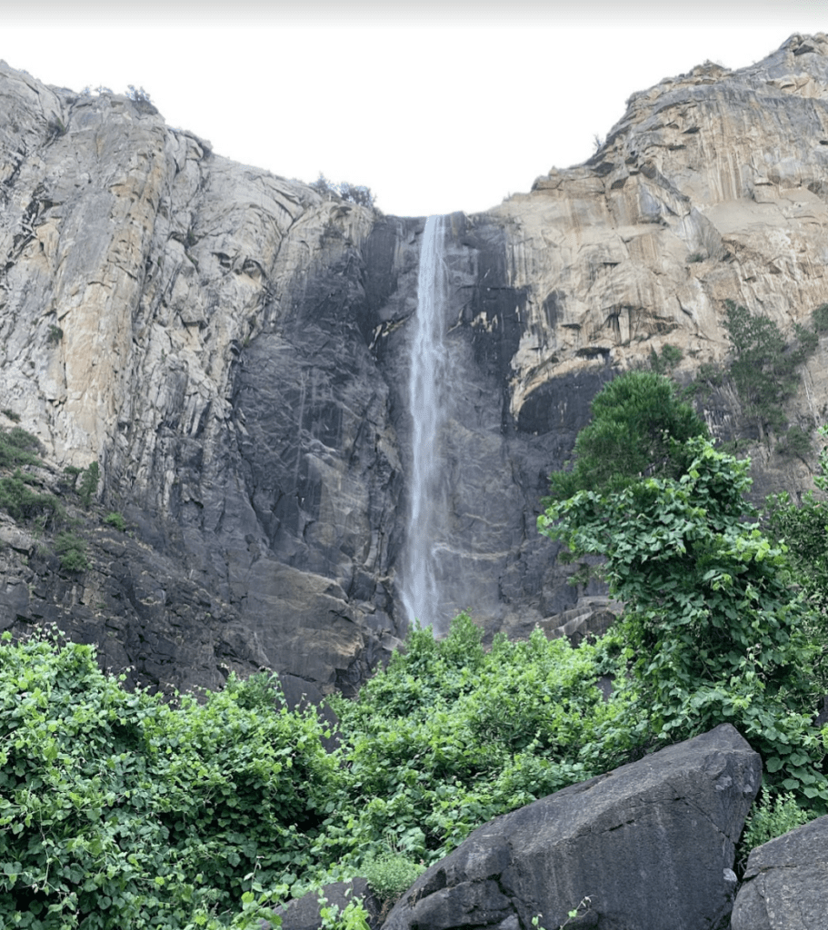 a waterfall in the mountains