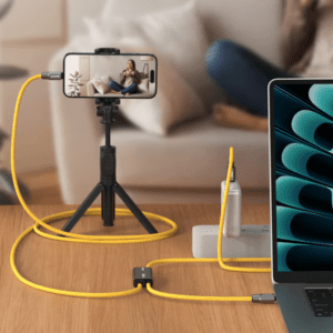 a laptop and phone on a table