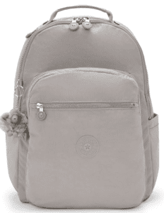 a backpack with a monkey toy