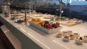 a buffet with fruit and vegetables