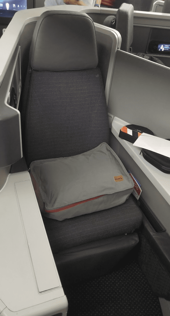 a seat with a pillow on it