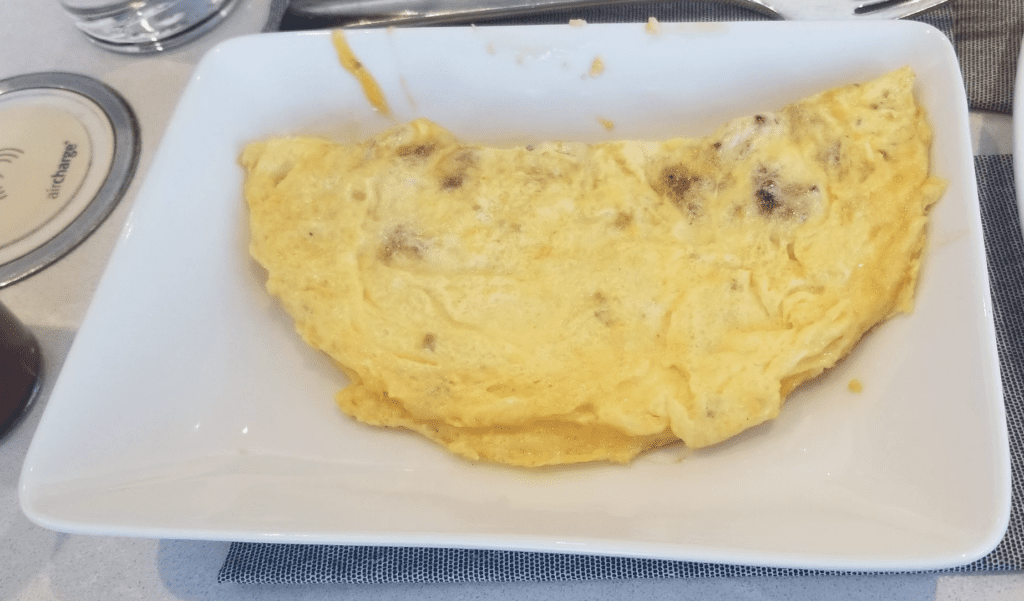 a plate of omelette on a table