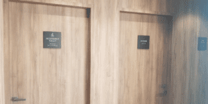 two doors with signs on them