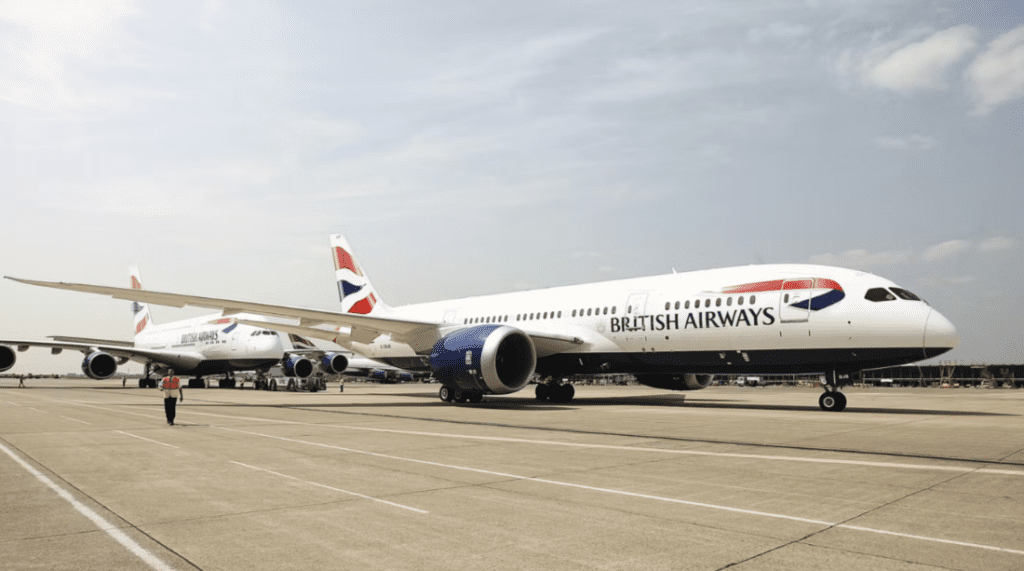 a group of airplanes on a runway