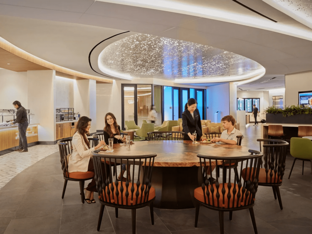 a group of people sitting around a table