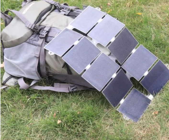 a solar panel on a backpack