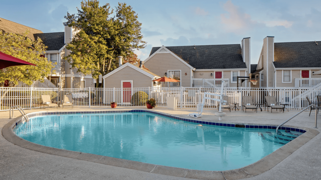 a swimming pool and a house